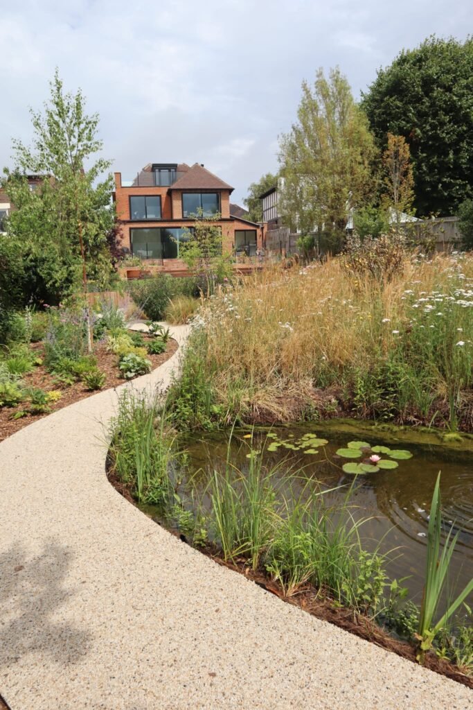 73dc89d1-b93c-40df-8cba-d1f1293cce5c pond planting resin paths Hove West Sussex