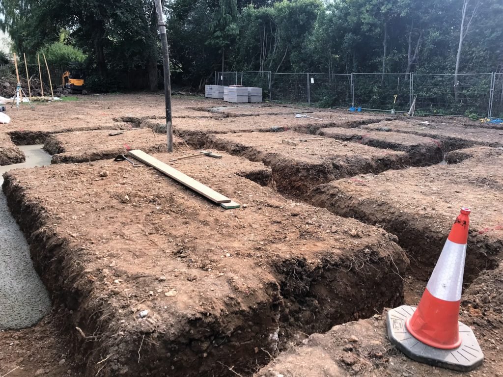 House footing being poured with concrete